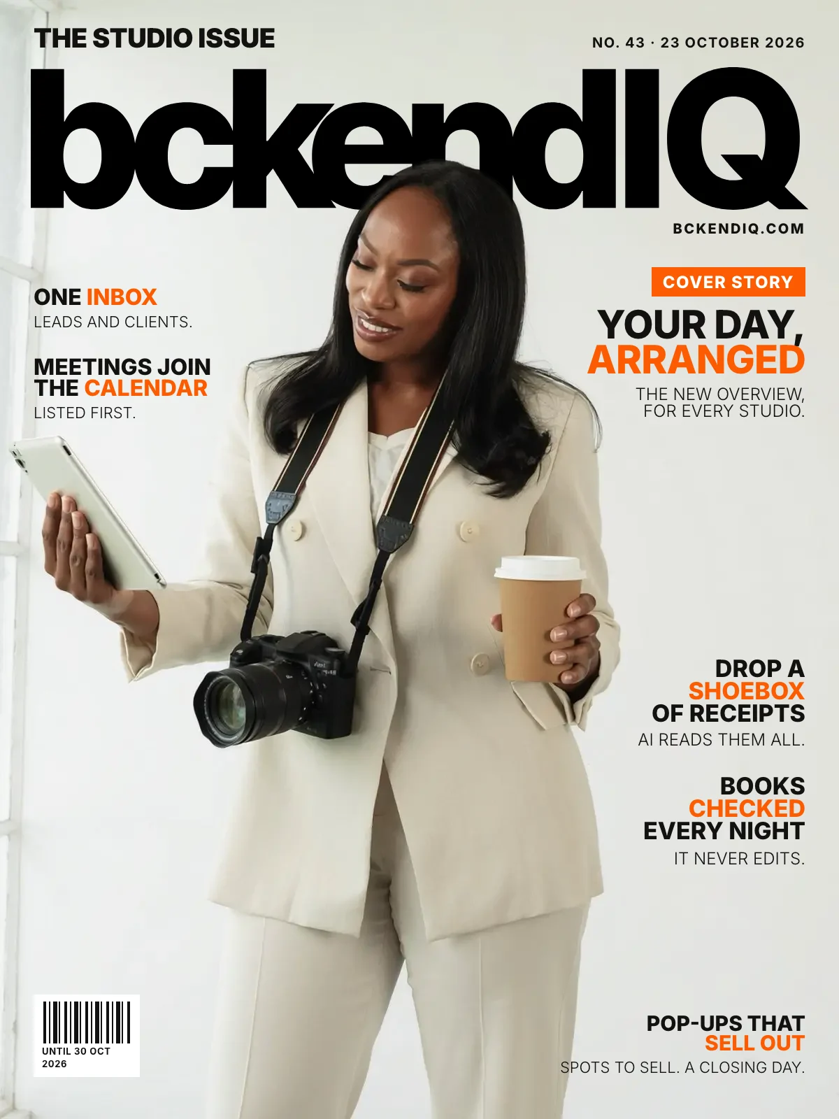 The Studio Issue, No. 43, 23 October 2026. A smiling photography studio owner in a cream suit reads a tablet beside a tall studio window, a camera on her strap and a coffee in her hand. On the cover: Your day, arranged: The new Overview, for every studio. One Inbox: Leads and clients. Meetings join the calendar: Listed first. Drop a shoebox of receipts: AI reads them all. Books checked every night: It never edits. Pop-ups that sell out: Spots to sell. A closing day.