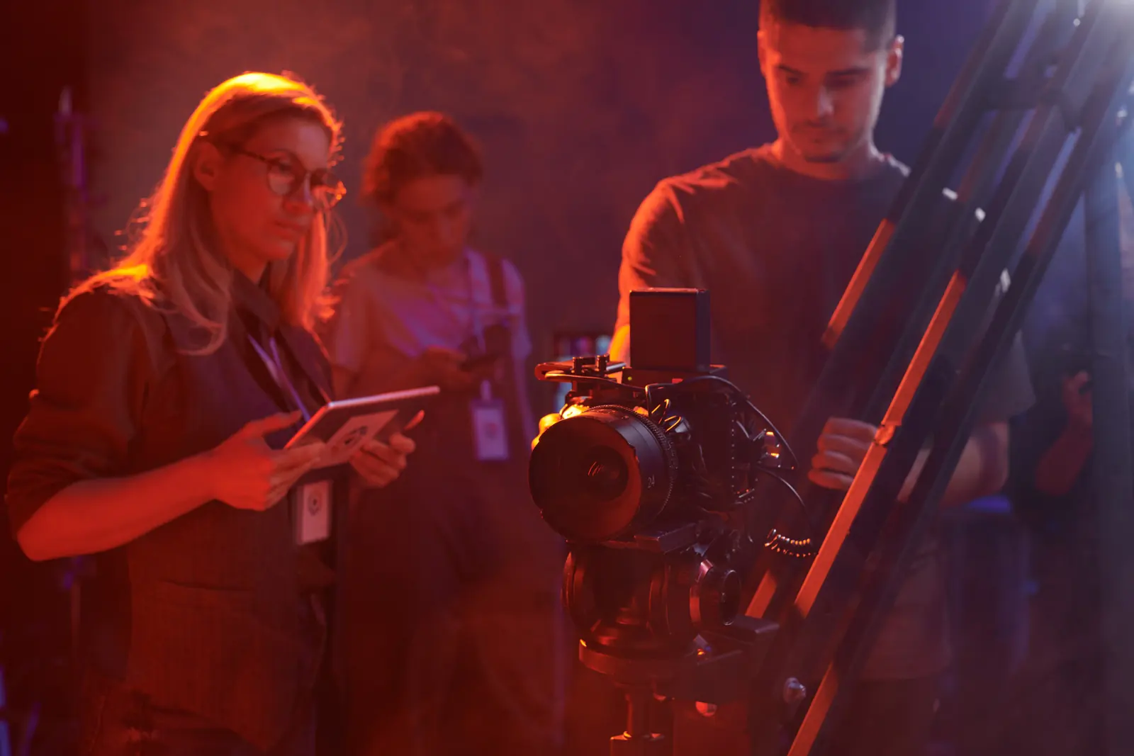 A video crew working together on set